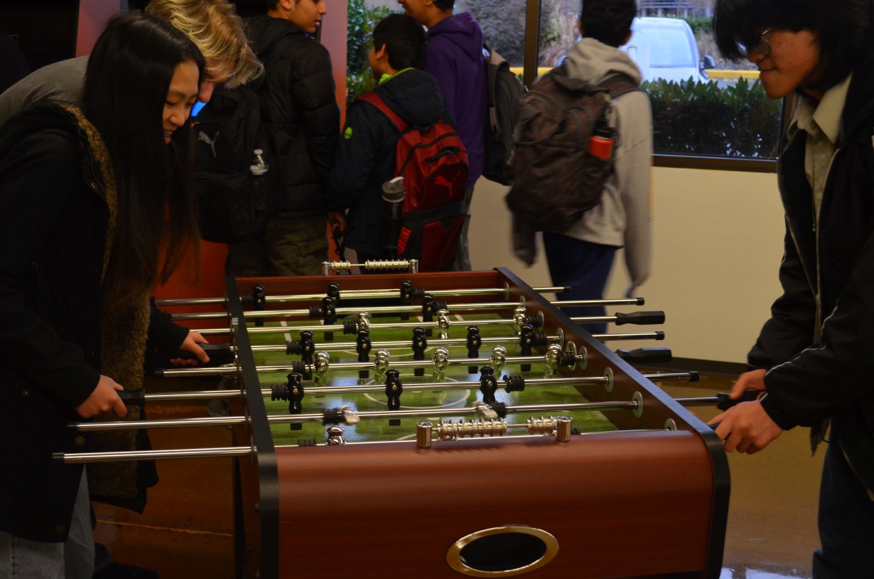 Photo of Attendees playing foosball